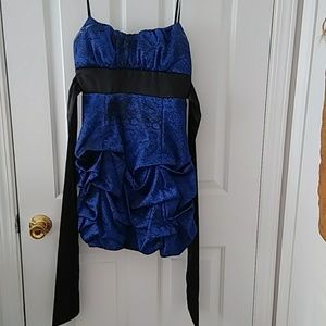 80's style ruffle dress.
